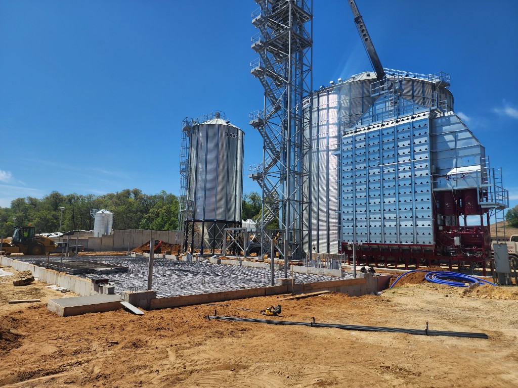 Agricultural concrete slab with grain silos and elevator