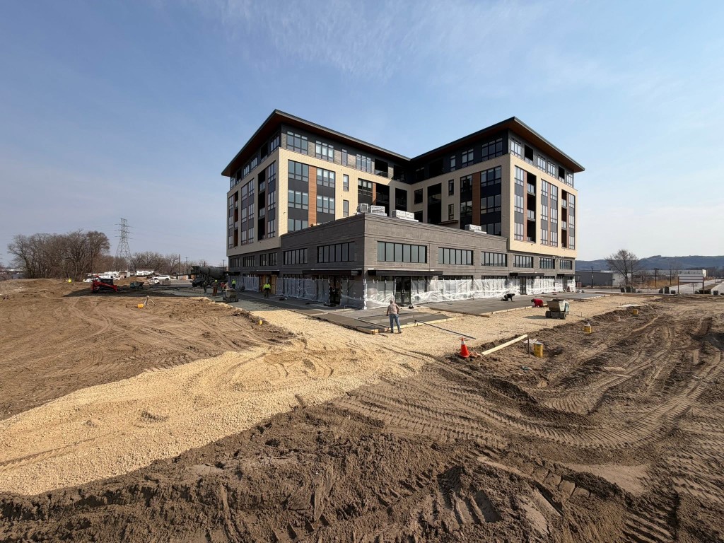 Multi-tenant building with concrete site work